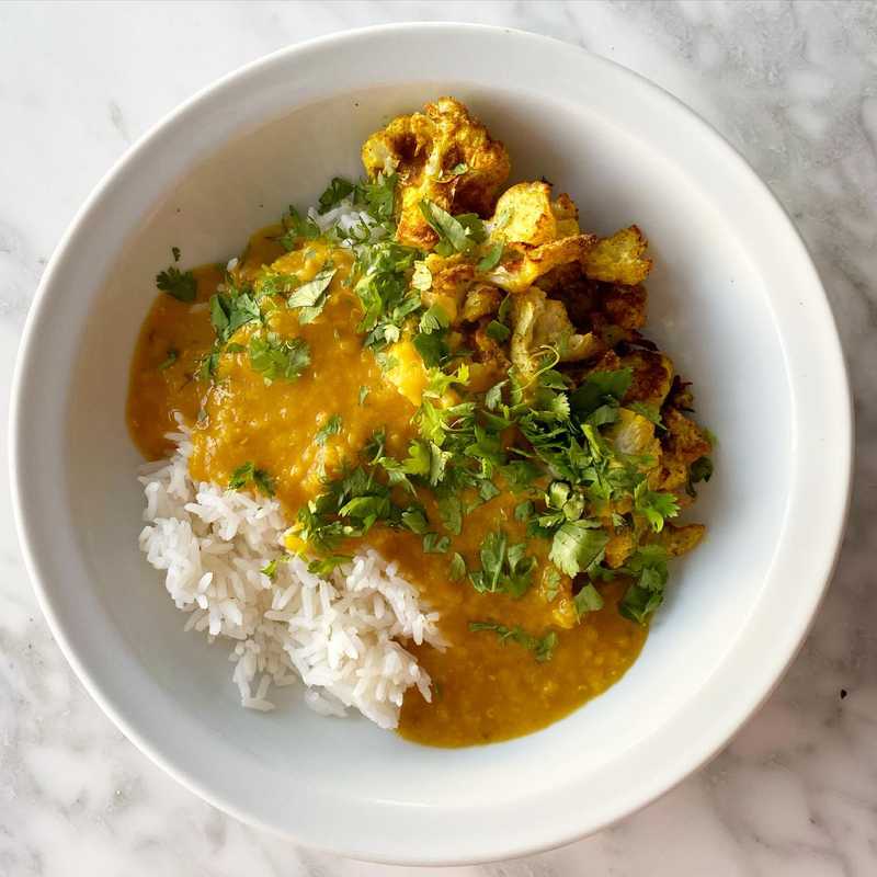 One of my favorite quick meals these days: Priya’s dal from Indian-ish. Tonight added 1/2 of a roasted cauliflower I needed to use up.